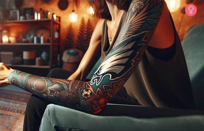 A woman with a Philadelphia Eagles sleeve tattoo on her arm