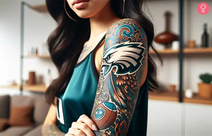 A woman with a traditional Philadelphia Eagles tattoo on her arm