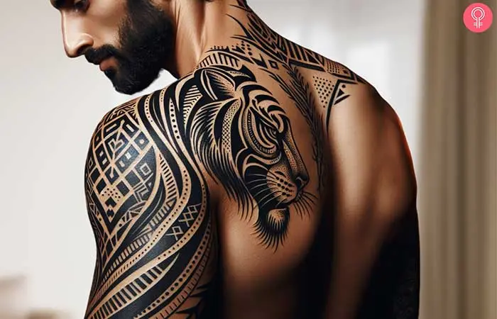 A man with a tribal shoulder tattoo.