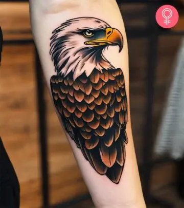 A traditional bald eagle tattoo on the forearm