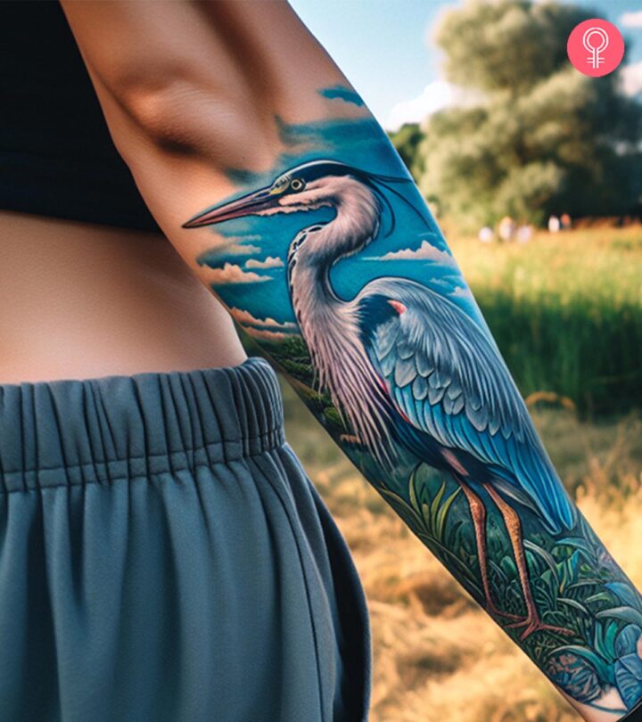 8 Stunning Blue Heron Tattoo Designs And Ideas A woman with a blue heron tattoo