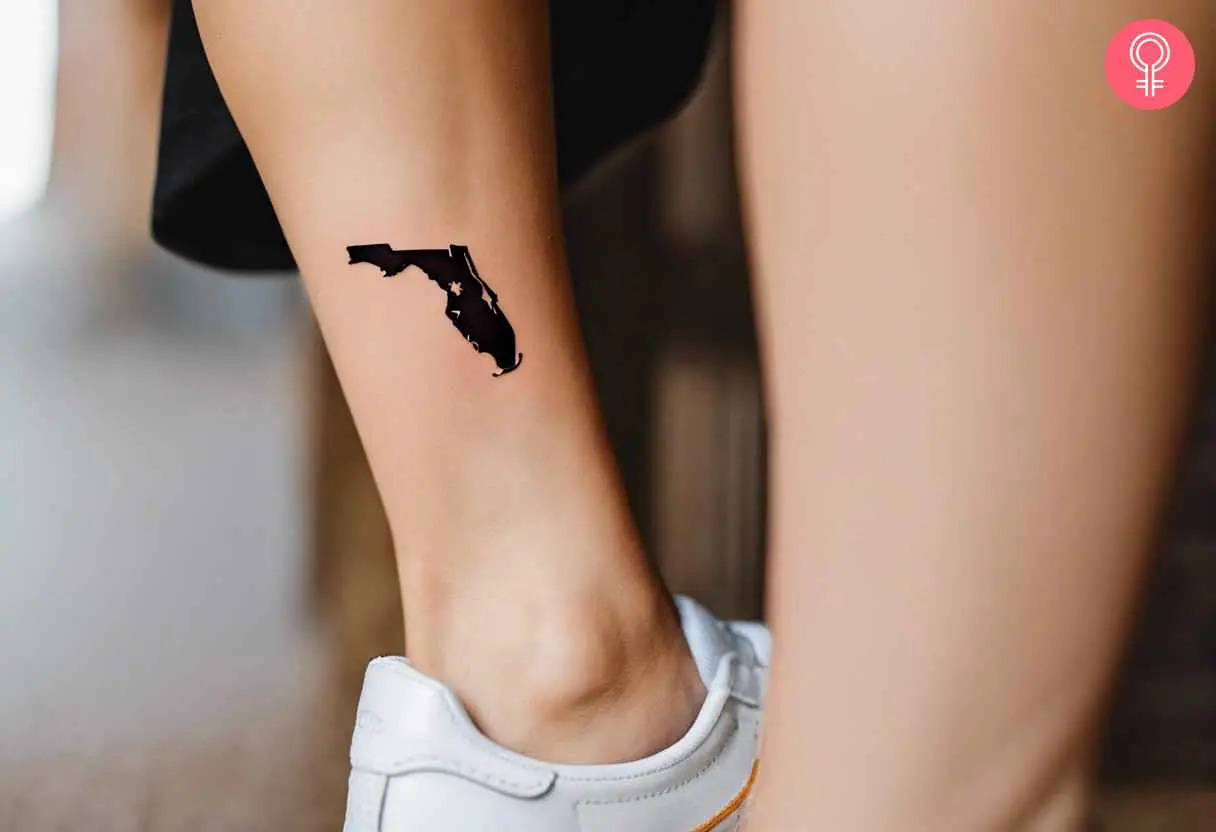 A woman with a small Florida tattoo near her ankle