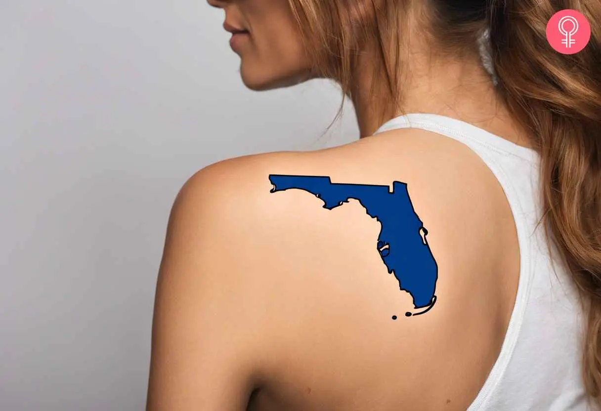 A woman with a State of Florida tattoo on her shoulder