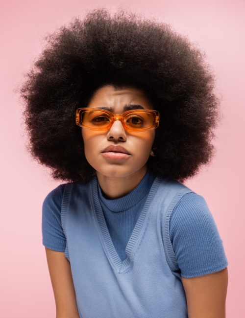 A stylish woman with a rounded Afro look