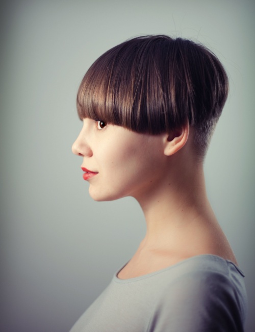  A woman with a geometric bowl cut