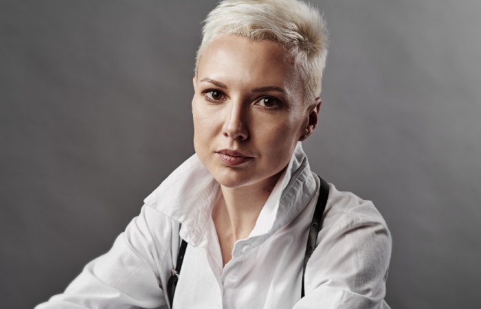 A woman with a pixie haircut