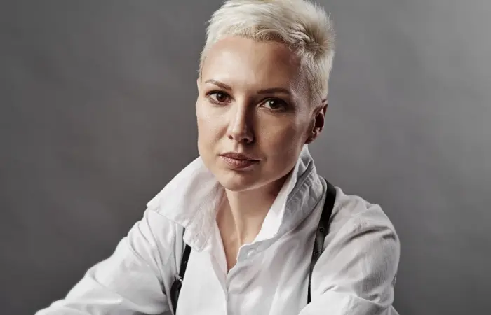 A woman with a pixie haircut