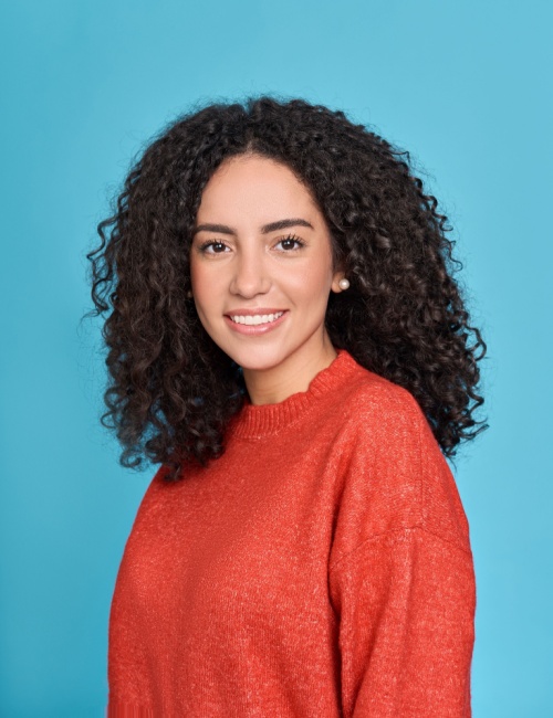 A woman with natural curls with volume hairstyle 