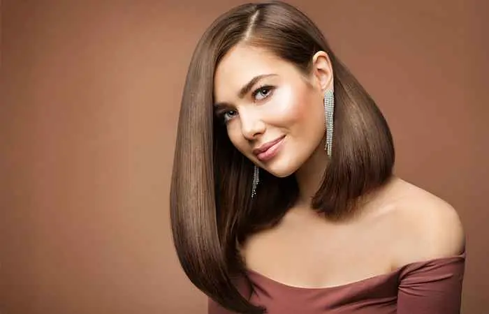 Woman with brown asymmetrical long bob