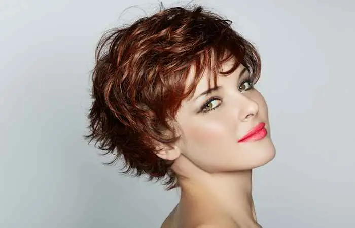 Woman with choppy layered pixie haircut