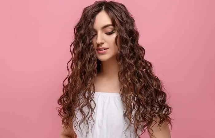Woman with curly long hair with layers