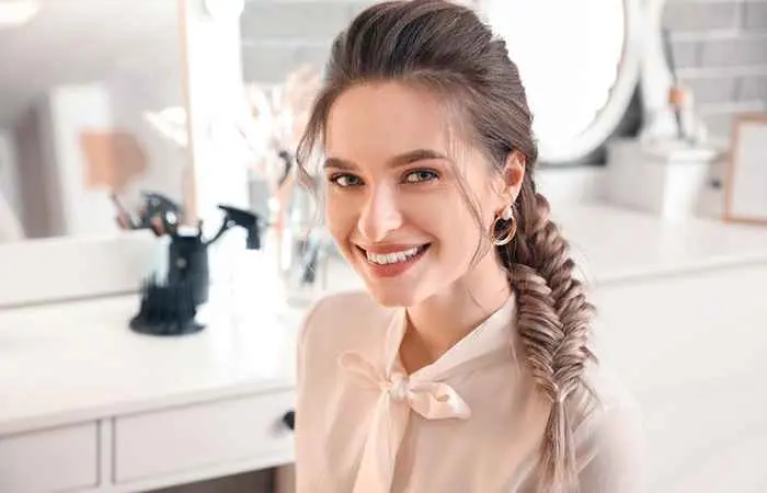 Woman with fishtail braid and puffy crown